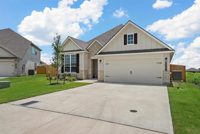3401 Beutel Rd, Lorena, TX 76655 - view of front of property with board and batten siding, driveway, a shingled roof, stone siding, and a garage