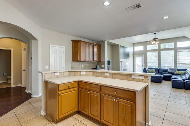 11398 Pear Ridge Dr, Frisco, TX 75035 - kitchen featuring ceiling fan, light tile patterned flooring, light countertops, tasteful backsplash, and recessed lighting