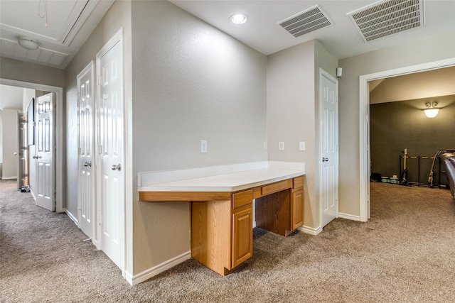 11398 Pear Ridge Dr, Frisco, TX 75035 - hall featuring light colored carpet, attic access, and a desk
