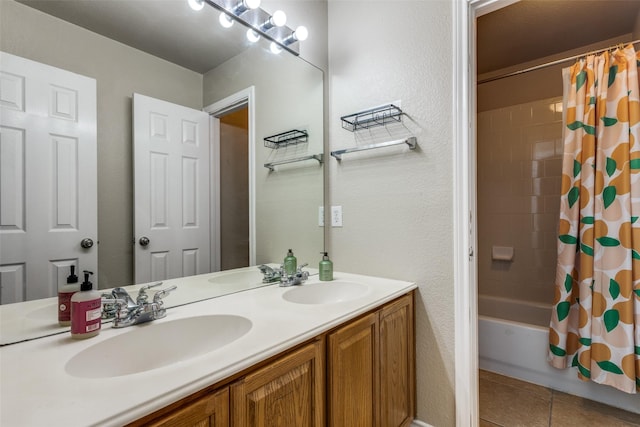 11398 Pear Ridge Dr, Frisco, TX 75035 - full bath featuring double vanity, shower / tub combo with curtain, tile patterned flooring, and a textured wall