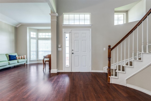 11398 Pear Ridge Dr, Frisco, TX 75035 - foyer with wood finished floors, healthy amount of natural light, ornamental molding, and stairway