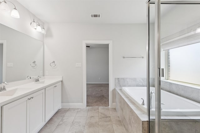 905 Plaza Ln, Argyle, TX 76226 - full bathroom featuring double vanity and a garden tub