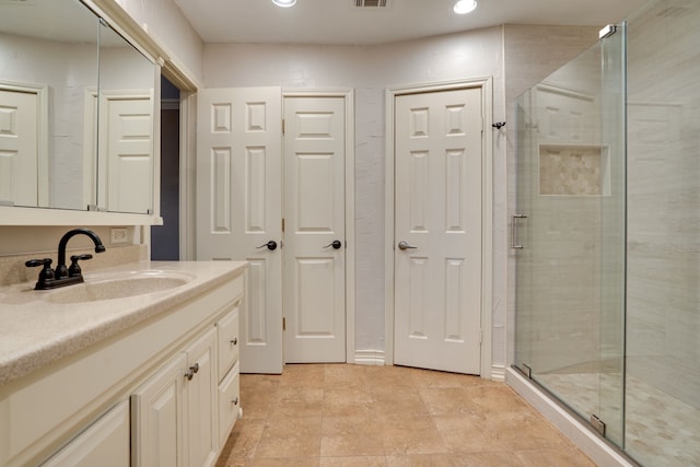 2086 Breezywood Dr, Flower Mound, TX 75022 - bathroom with vanity, a shower stall, and recessed lighting