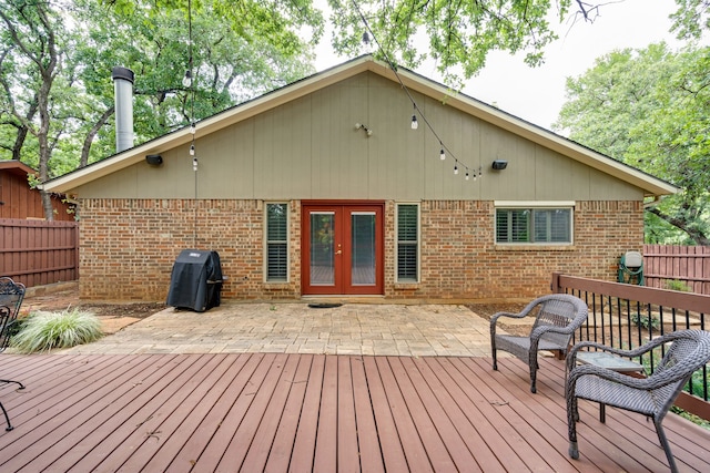 2086 Breezywood Dr, Flower Mound, TX 75022 - wooden deck with area for grilling, french doors, and a patio