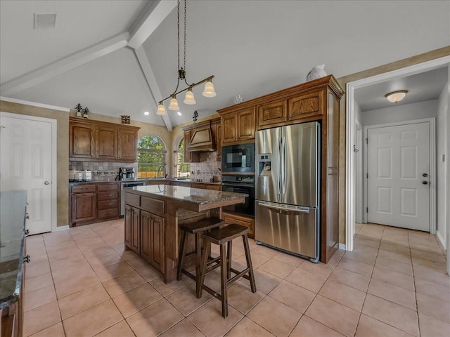 10353 W Dublin Dr, Forney, TX 75126 - kitchen with black appliances, light tile patterned flooring, backsplash, a kitchen island, and brown cabinetry