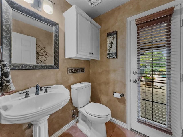 10353 W Dublin Dr, Forney, TX 75126 - half bathroom featuring toilet and tile patterned floors