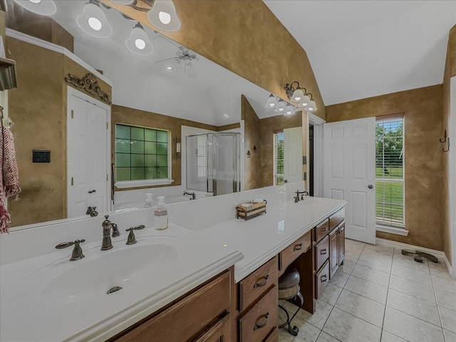 10353 W Dublin Dr, Forney, TX 75126 - bathroom featuring vaulted ceiling, double vanity, a shower stall, and tile patterned floors