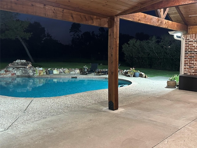 10353 W Dublin Dr, Forney, TX 75126 - pool at night featuring a patio and an outdoor pool