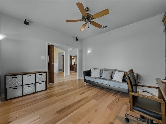 10353 W Dublin Dr, Forney, TX 75126 - office space featuring arched walkways, a ceiling fan, and light wood finished floors