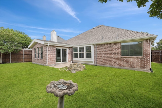 4069 White Porch Rd, Plano, TX 75024 - rear view of property featuring an outdoor fire pit, brick siding, and a chimney