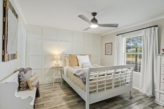 900 Amy Way, Bonham, TX 75418 - bedroom with crown molding, light wood-style floors, and ceiling fan