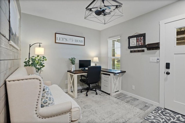 900 Amy Way, Bonham, TX 75418 - home office with light wood-style flooring and a chandelier