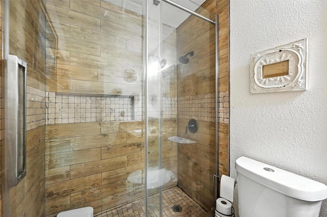 8311 Paxson Trl, Dallas, TX 75249 - full bath with a shower stall and a textured wall