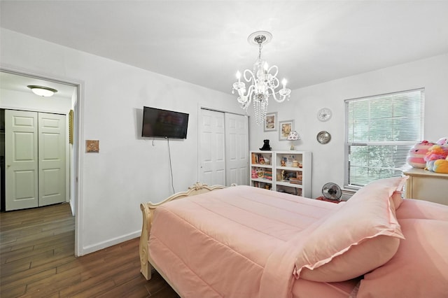 8311 Paxson Trl, Dallas, TX 75249 - bedroom featuring a chandelier, wood finished floors, and a closet