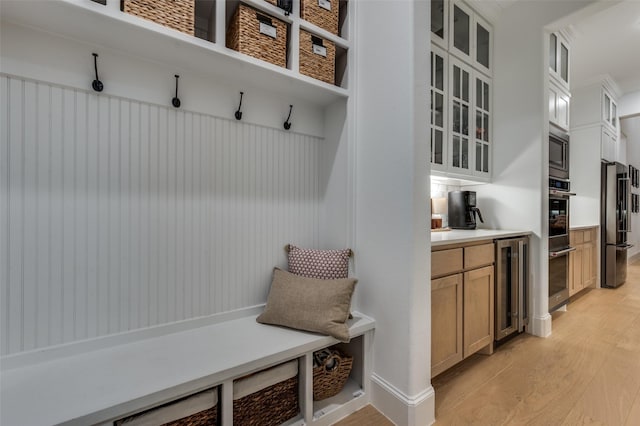 11405 Antler Ridge Way, Argyle, TX 76226 - mudroom featuring light wood-type flooring and beverage cooler