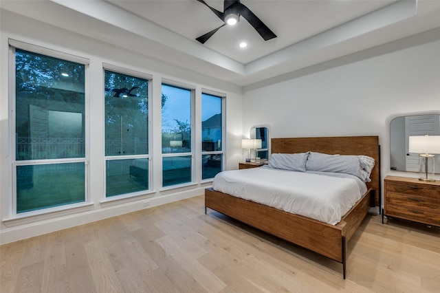 11405 Antler Ridge Way, Argyle, TX 76226 - bedroom featuring wood finished floors, a raised ceiling, a ceiling fan, and recessed lighting