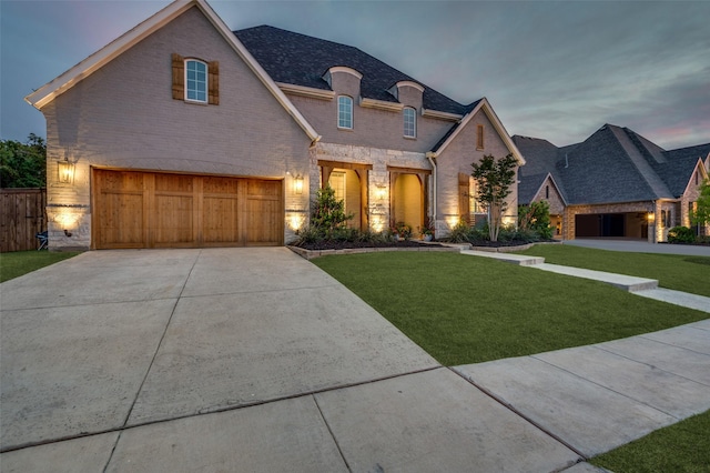 11405 Antler Ridge Way, Argyle, TX 76226 - french country home featuring brick siding, concrete driveway, and a garage
