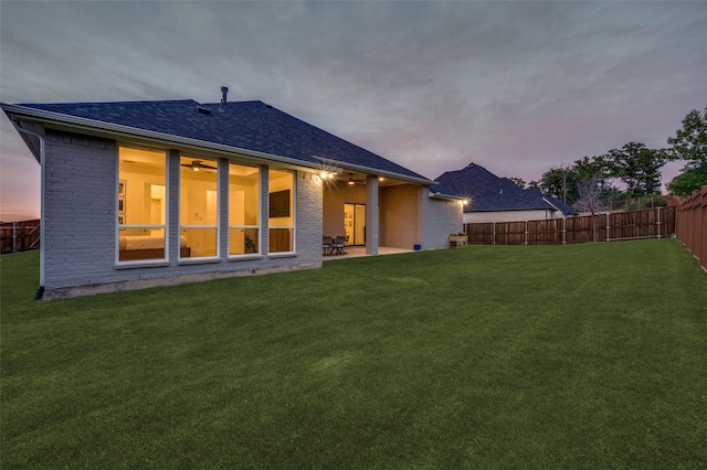 11405 Antler Ridge Way, Argyle, TX 76226 - back of house featuring a fenced backyard, brick siding, a ceiling fan, a shingled roof, and a patio area