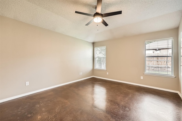7921 Mourning Dove Dr, Arlington, TX 76002 - empty room with concrete floors, a textured ceiling, and a ceiling fan