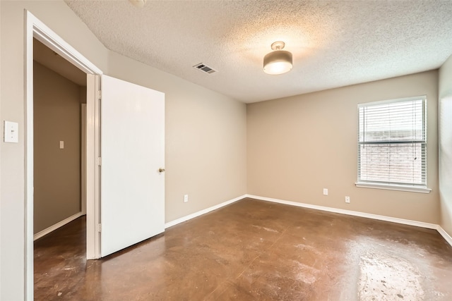 7921 Mourning Dove Dr, Arlington, TX 76002 - unfurnished room featuring finished concrete floors and a textured ceiling