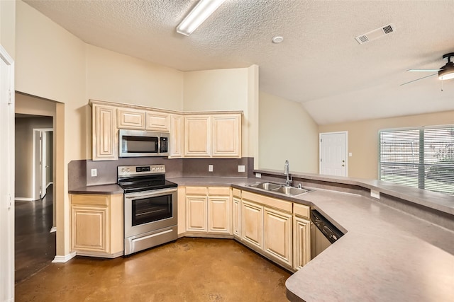7921 Mourning Dove Dr, Arlington, TX 76002 - kitchen featuring appliances with stainless steel finishes, finished concrete floors, lofted ceiling, a textured ceiling, and a ceiling fan