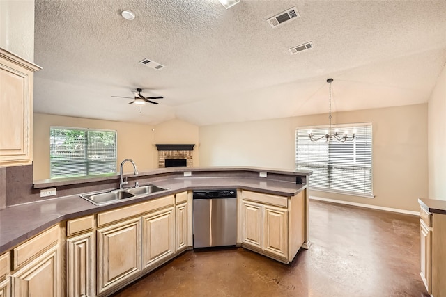7921 Mourning Dove Dr, Arlington, TX 76002 - kitchen featuring dishwasher, concrete flooring, a fireplace, ceiling fan, and dark countertops