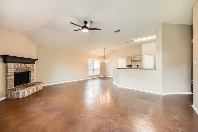 7921 Mourning Dove Dr, Arlington, TX 76002 - unfurnished living room with lofted ceiling, concrete flooring, a ceiling fan, a chandelier, and a fireplace