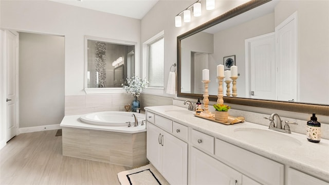 2809 Burgundy Trl, Rowlett, TX 75088 - full bathroom with a bath and double vanity