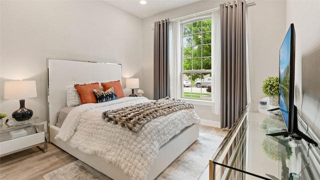 2809 Burgundy Trl, Rowlett, TX 75088 - bedroom with light wood-type flooring and recessed lighting