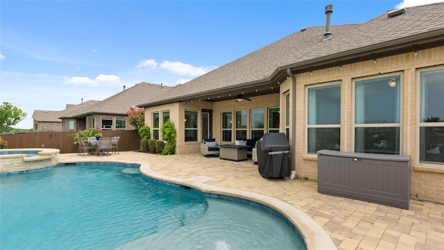 2809 Burgundy Trl, Rowlett, TX 75088 - view of pool with a patio, area for grilling, a ceiling fan, and a pool with connected hot tub