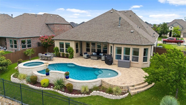 2809 Burgundy Trl, Rowlett, TX 75088 - view of pool with an outdoor hangout area, a patio area, a fenced backyard, a pool with connected hot tub, and grilling area