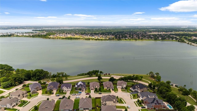 2809 Burgundy Trl, Rowlett, TX 75088 - aerial overview of property's location with nearby suburban area and a large body of water