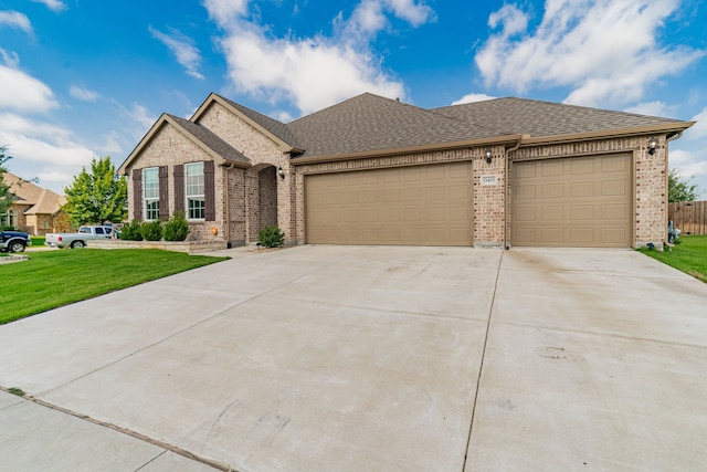 11401 Gale Ridge Ter, Fort Worth, TX 76052 - view of front of house with brick siding, an attached garage, and concrete driveway