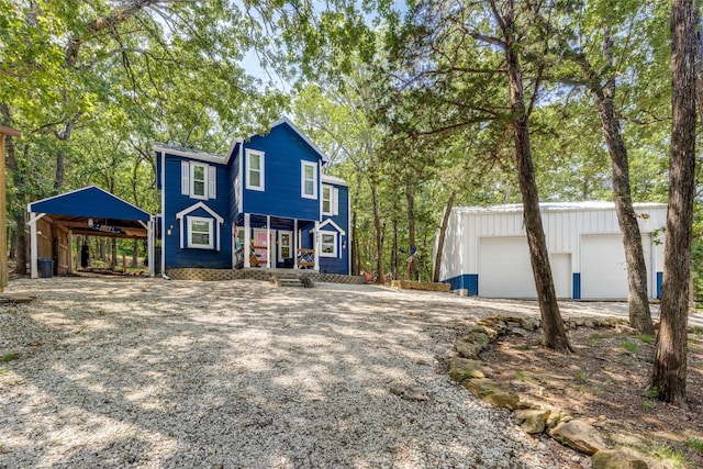 191 Black Forest Dr, Pottsboro, TX 75076 - view of front facade featuring an outdoor structure and covered porch