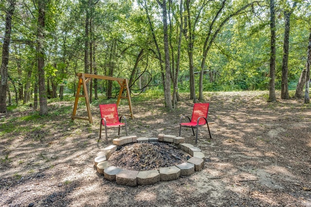 191 Black Forest Dr, Pottsboro, TX 75076 - view of yard featuring a fire pit and a forest view