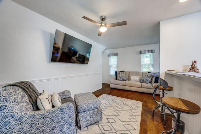 191 Black Forest Dr, Pottsboro, TX 75076 - living area with wood finished floors, a ceiling fan, and a wainscoted wall