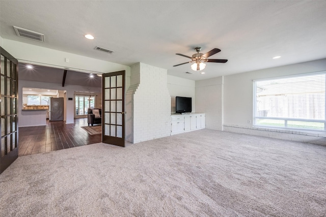 710 Northridge St, Denton, TX 76201 - unfurnished living room with french doors, carpet flooring, a ceiling fan, and recessed lighting
