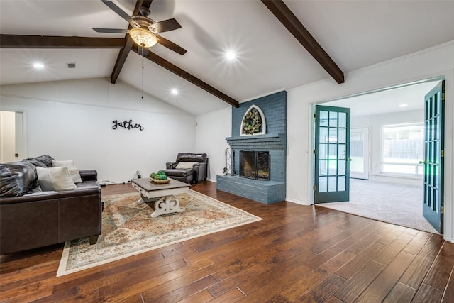 710 Northridge St, Denton, TX 76201 - living room with a brick fireplace, wood finished floors, a ceiling fan, and recessed lighting