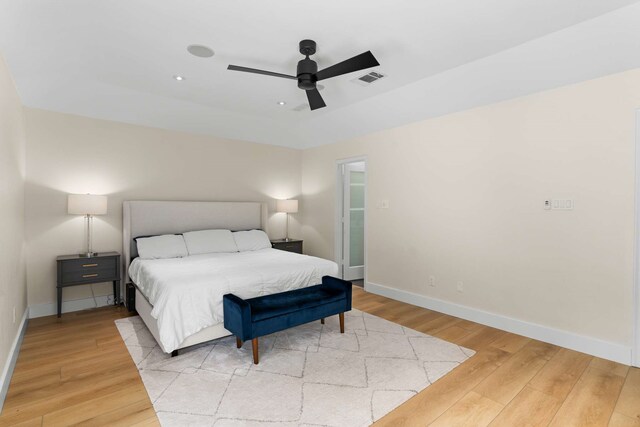 6207 Crested Butte Dr, Dallas, TX 75252 - bedroom featuring light wood-style flooring and ceiling fan