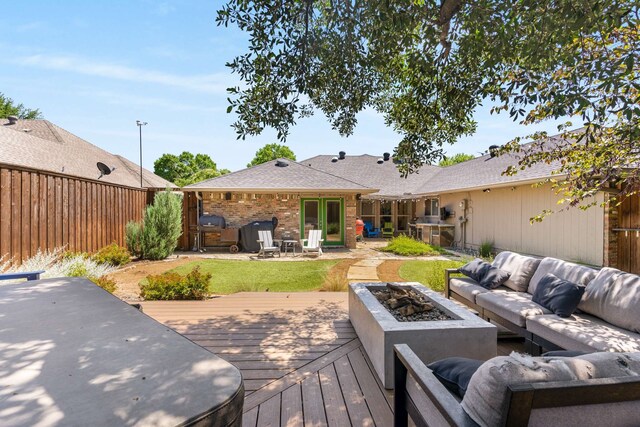 6207 Crested Butte Dr, Dallas, TX 75252 - wooden deck featuring an outdoor living space with a fire pit
