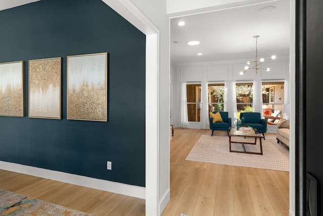 6207 Crested Butte Dr, Dallas, TX 75252 - hall featuring wood finished floors, recessed lighting, and a chandelier