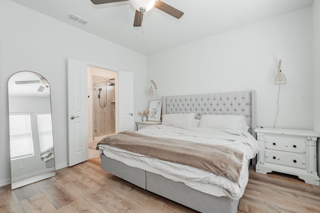 1447 Rolling Fox Dr, Forney, TX 75126 - bedroom featuring wood finished floors, ensuite bath, and ceiling fan
