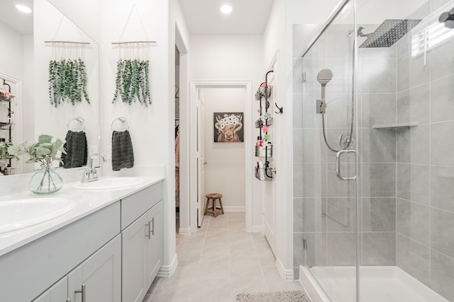 1447 Rolling Fox Dr, Forney, TX 75126 - full bathroom with double vanity, a stall shower, and tile patterned floors