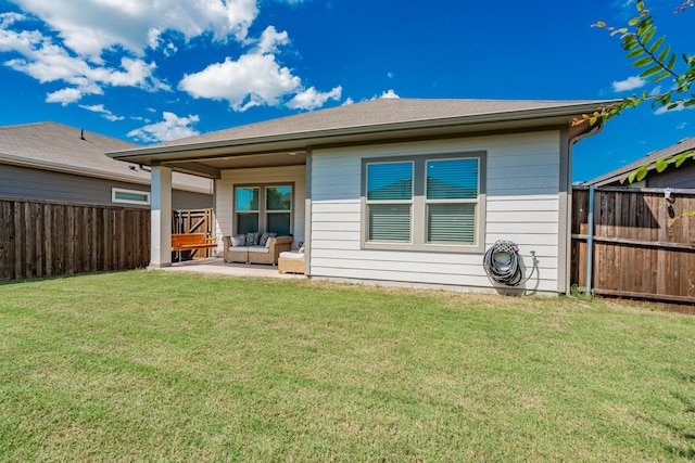 1447 Rolling Fox Dr, Forney, TX 75126 - back of house with a fenced backyard, a patio, and an outdoor living space