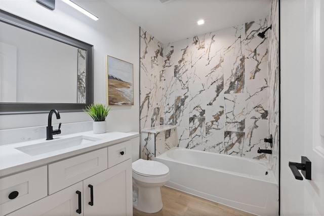 2605 S Glenbrook Dr, Garland, TX 75041 - full bath with wood finished floors, vanity, and shower / bath combination