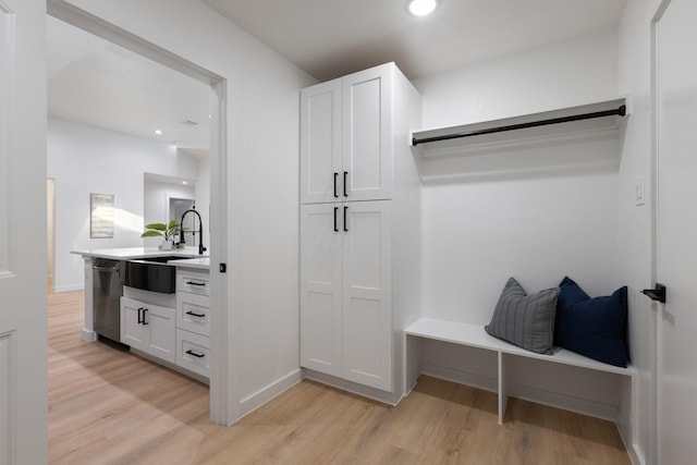 2605 S Glenbrook Dr, Garland, TX 75041 - mudroom with light wood-style flooring and recessed lighting