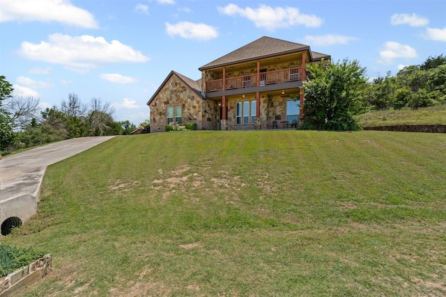 111 Meadow Bridge Dr, Weatherford, TX 76085 - back of property featuring stone siding and a lawn