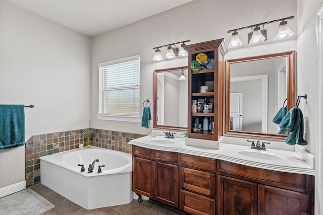 111 Meadow Bridge Dr, Weatherford, TX 76085 - full bath with double vanity, a garden tub, and tile patterned flooring