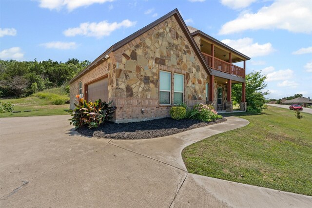 111 Meadow Bridge Dr, Weatherford, TX 76085 - view of front of home featuring stone siding, a balcony, a front lawn, a garage, and concrete driveway