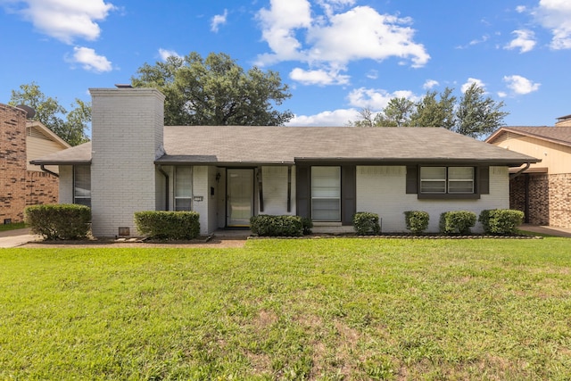 1124 Janell Dr, Irving, TX 75062 - single story home featuring brick siding, a front yard, a chimney, and roof with shingles
